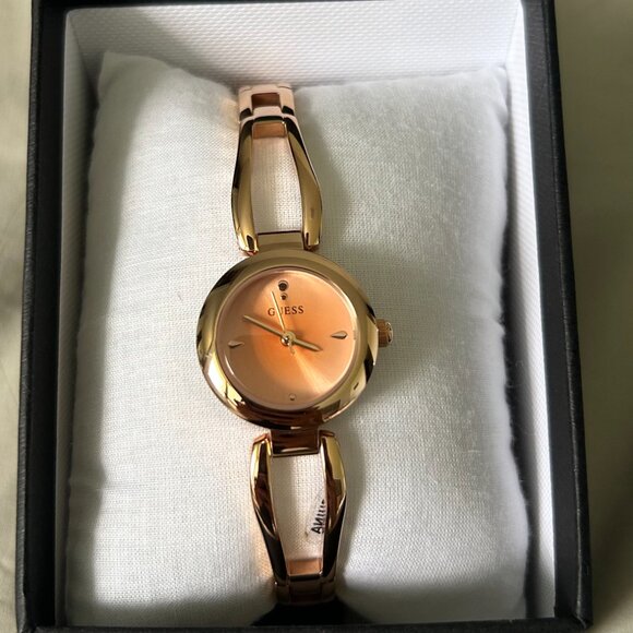 Guess Rose Gold-Tone Cutout Bracelet Analog Watch - Picture 5 of 13